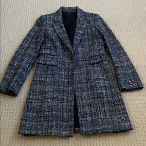 Knee length steel grey overcoat/jacket.
